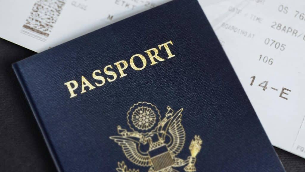 A passport with a boarding pass.