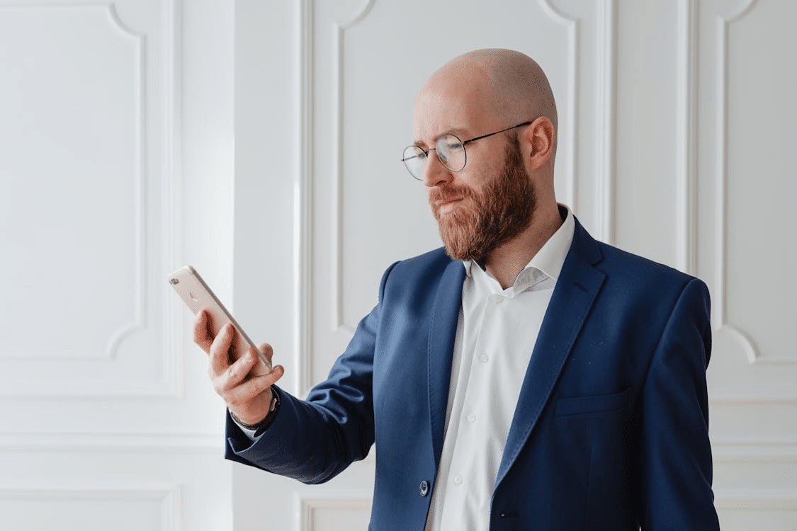 A man looking at his phone