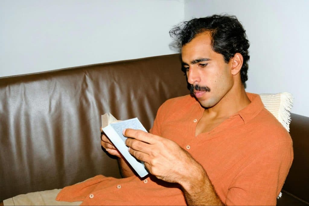 A man checking his list