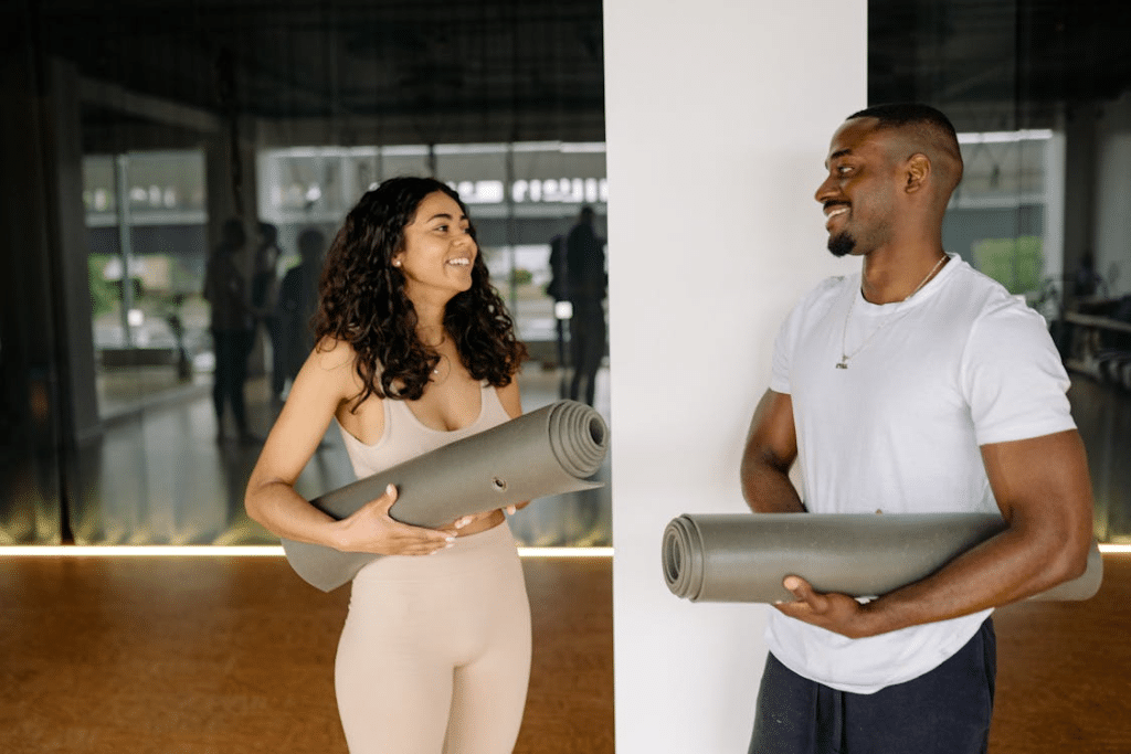 A man and a woman at the gym