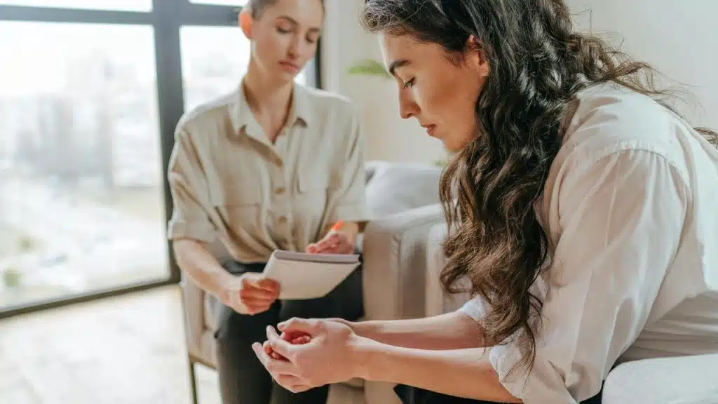 A woman talking to a therapist.