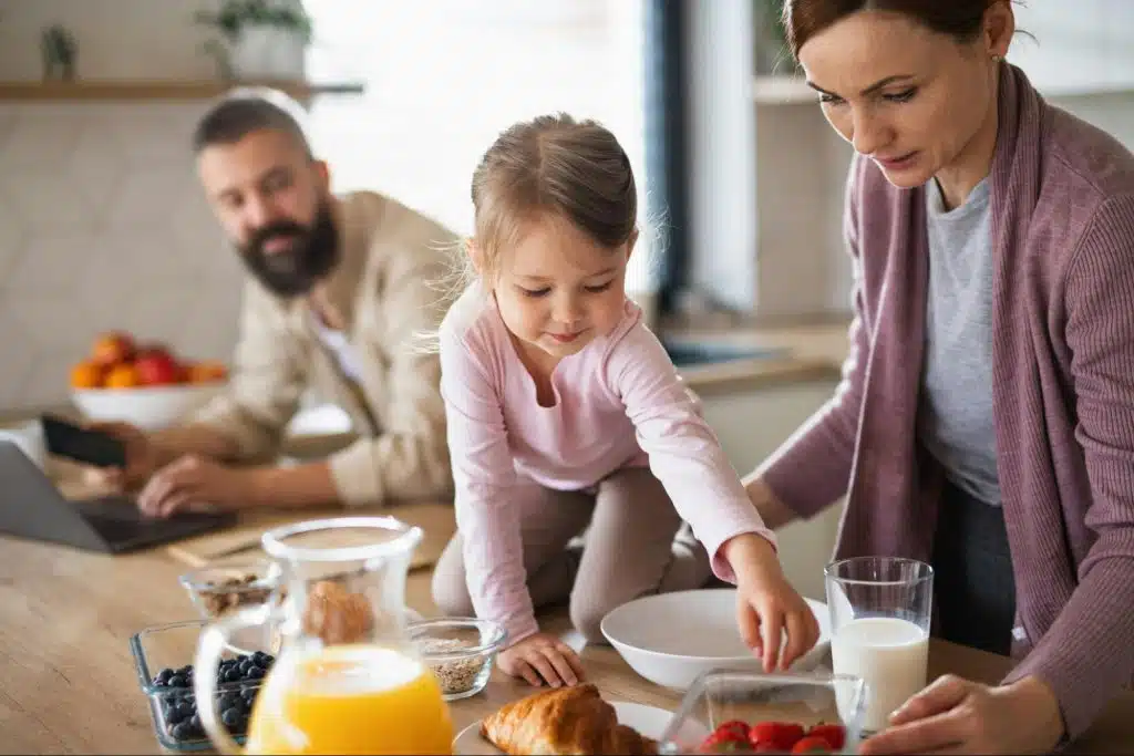 A man observing wife and his baby