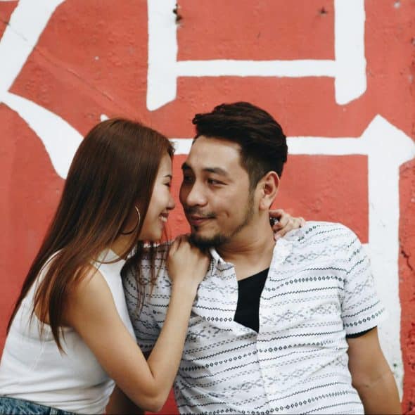 A man and woman looking at each other