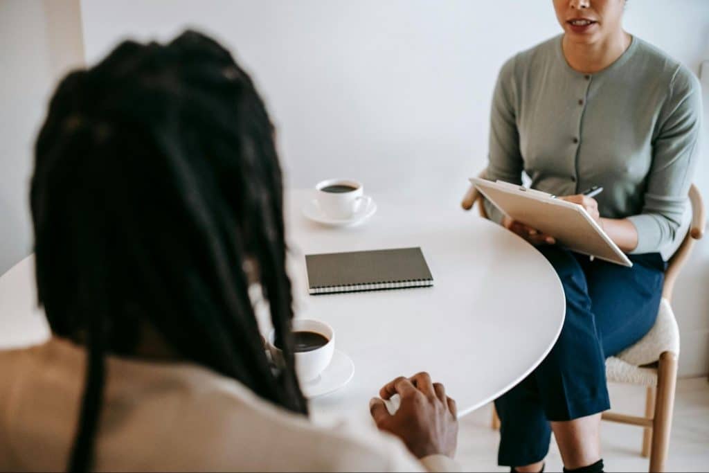 A woman making a plan and a man does not want to participate