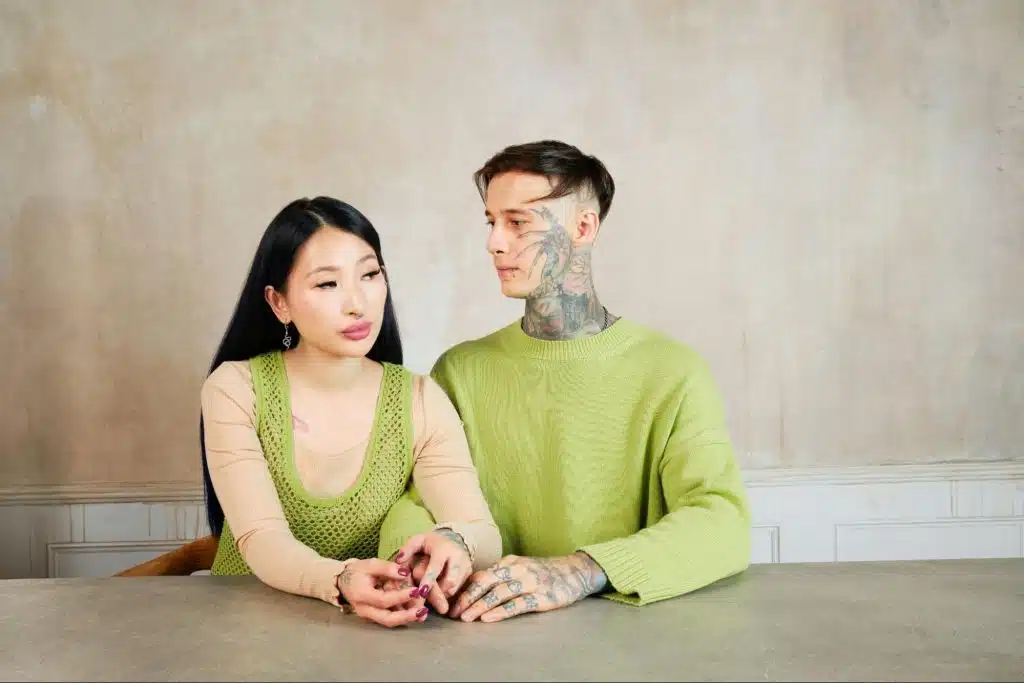 A man looking at the woman