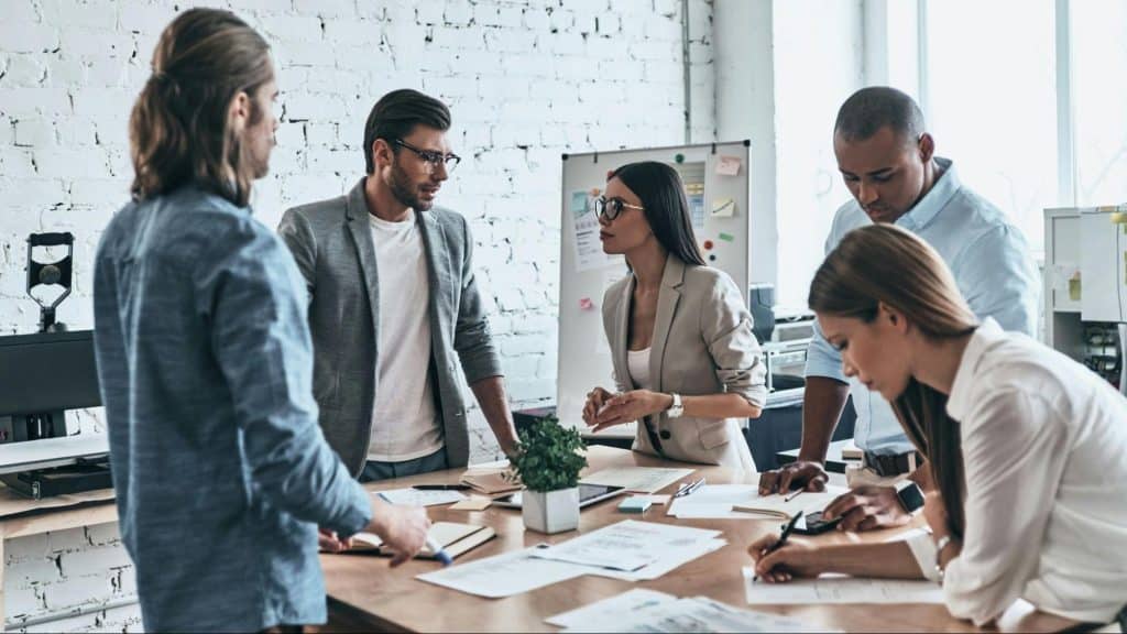 A man with his colleagues
