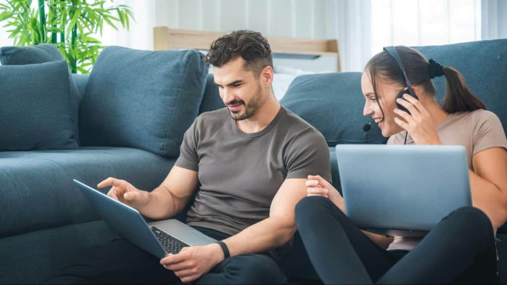 A woman complimenting a man with his work