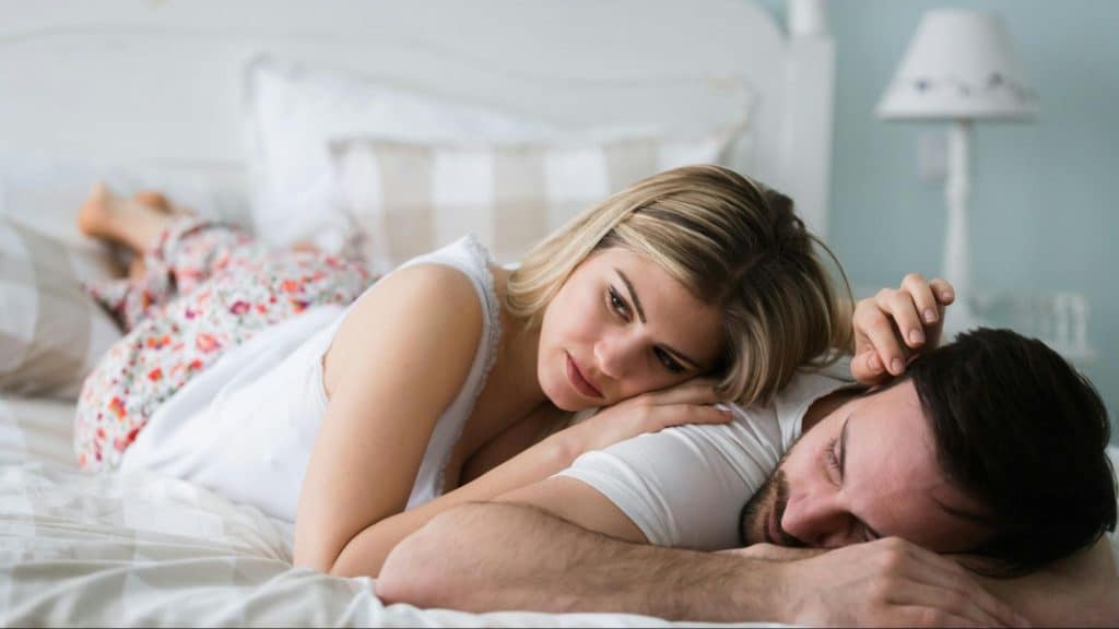 A man pretending to sleep