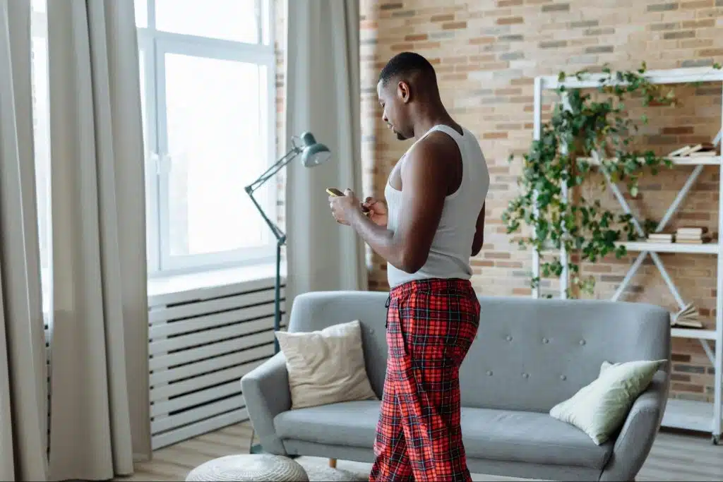 A man texting his partner to make her feel guilty