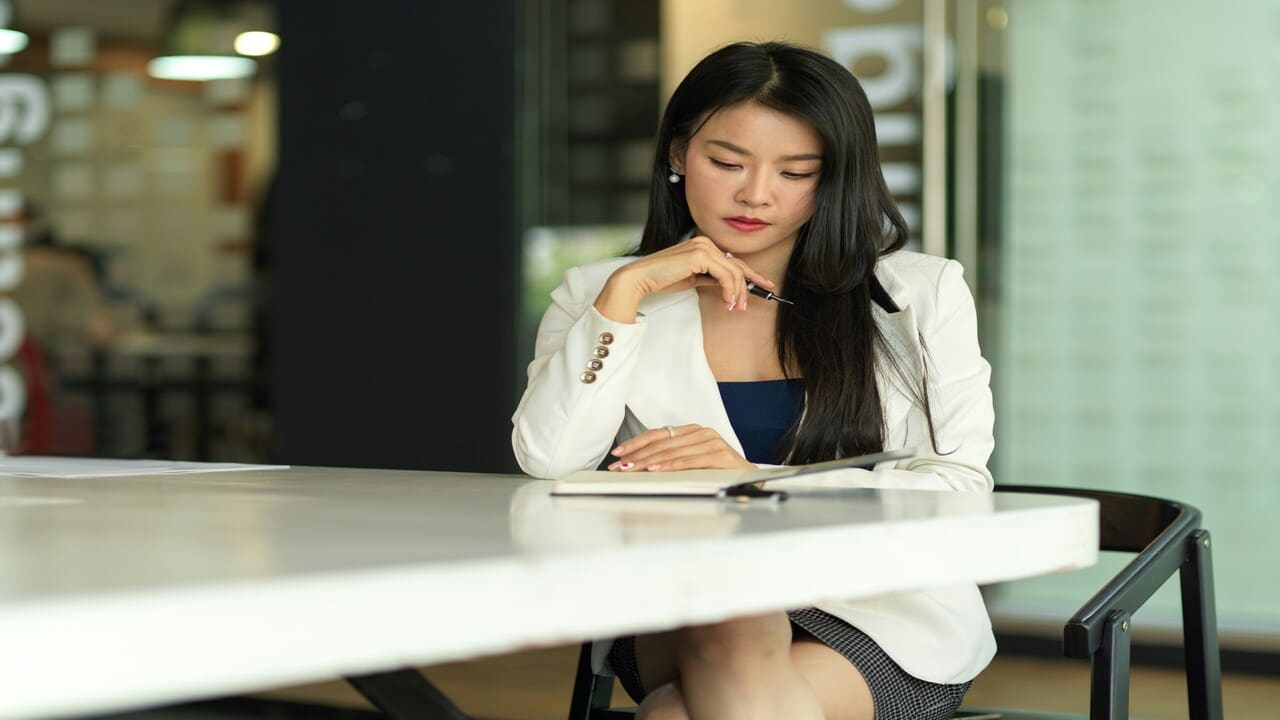 A businesswoman at a meeting