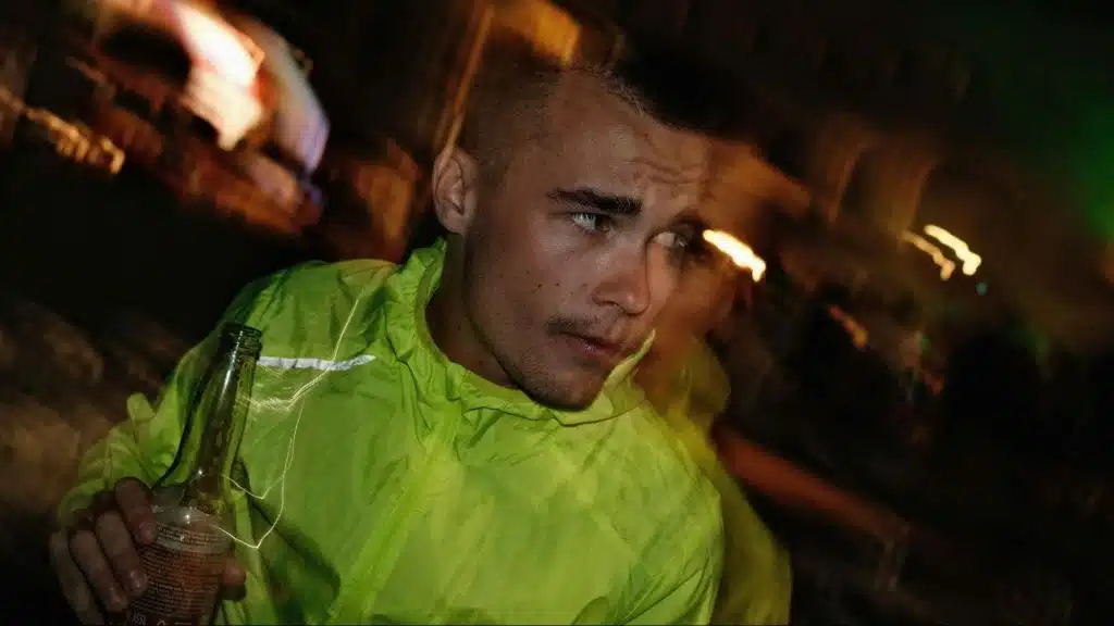 A man drinking alcohol