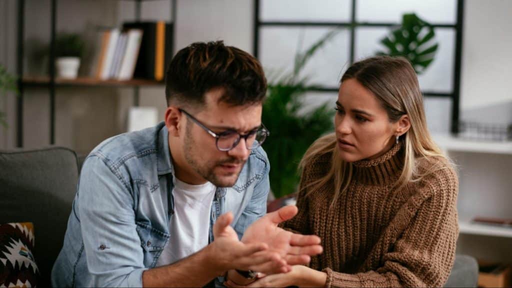 A man and woman having a serious conversation after the arguments