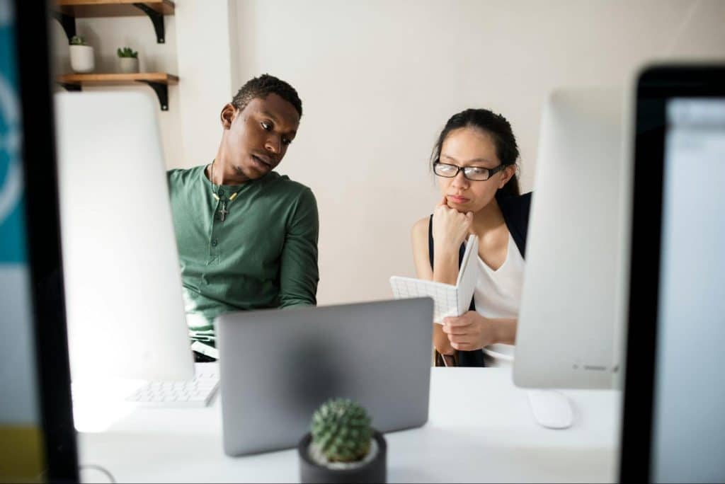 A man looking at the struggling woman