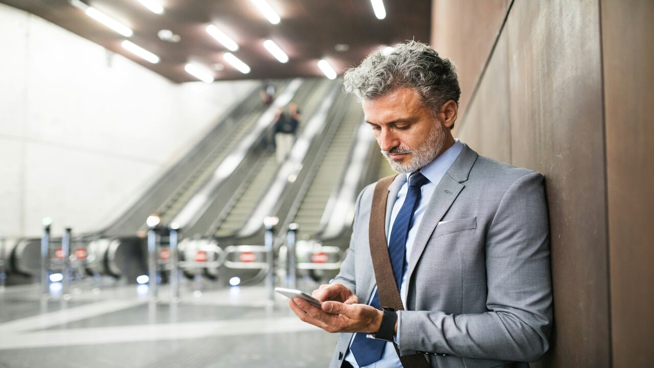 A man waiting for a text