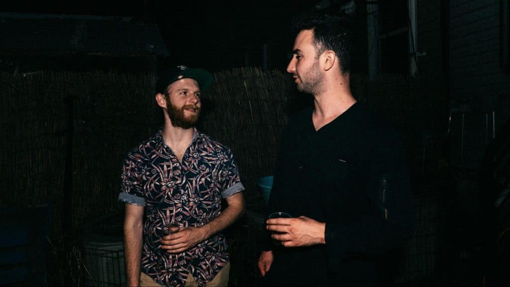 Two men talking
