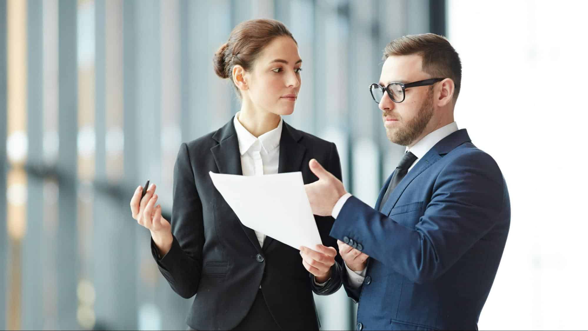A woman listening to a man