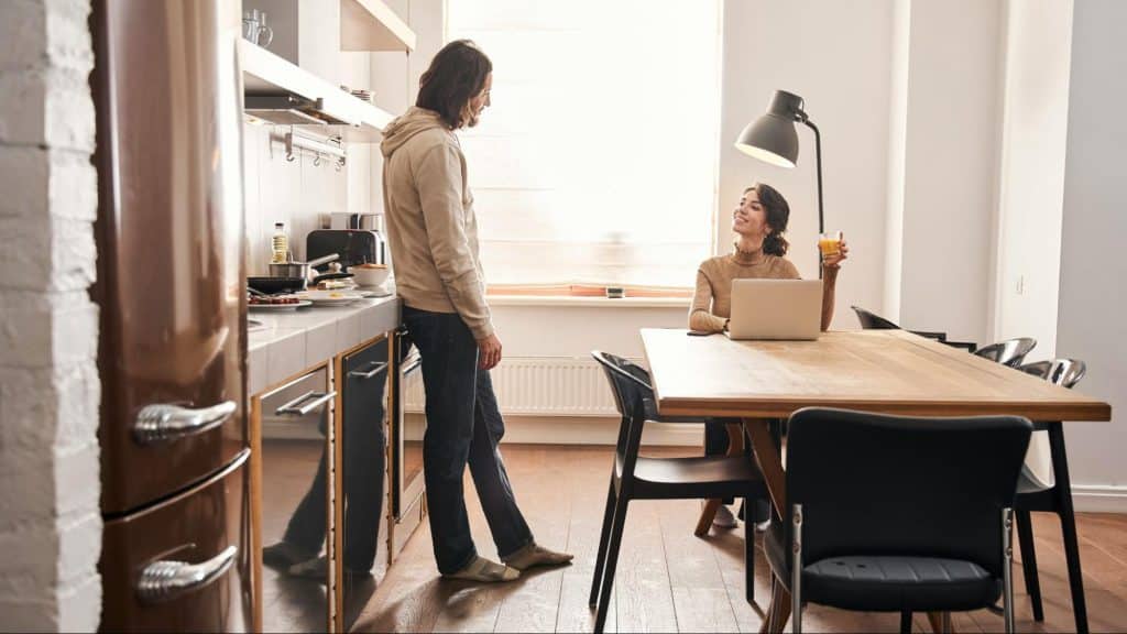A man and woman talking
