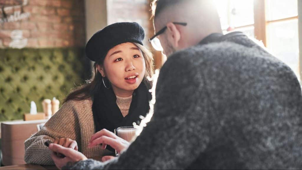 Woman observing man’s actions