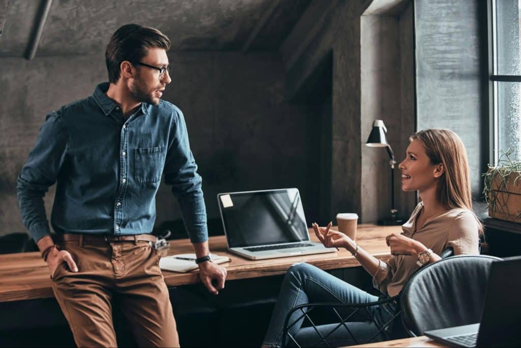 A man and woman talking