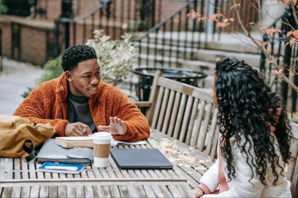 A man looking at the woman