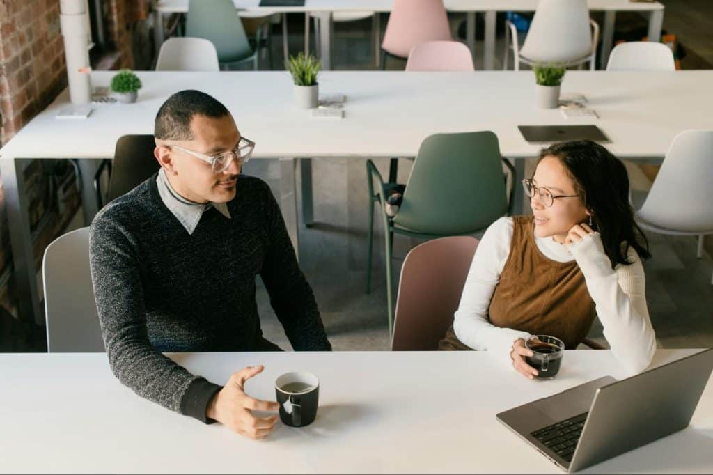 A man and woman talking
