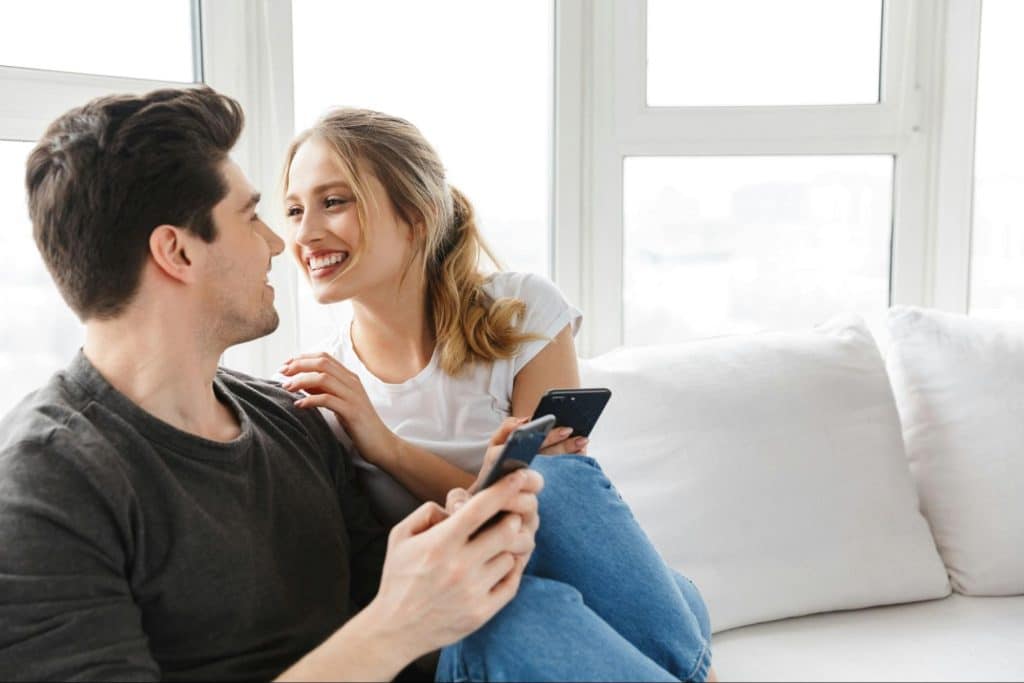 A man and woman together at home