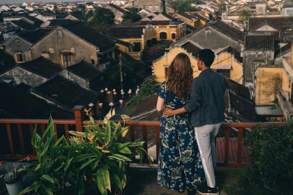 A man and woman at the balcony