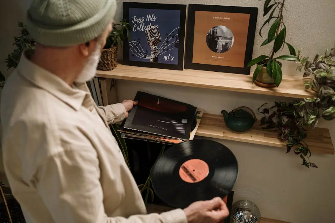A man playing a playlist
