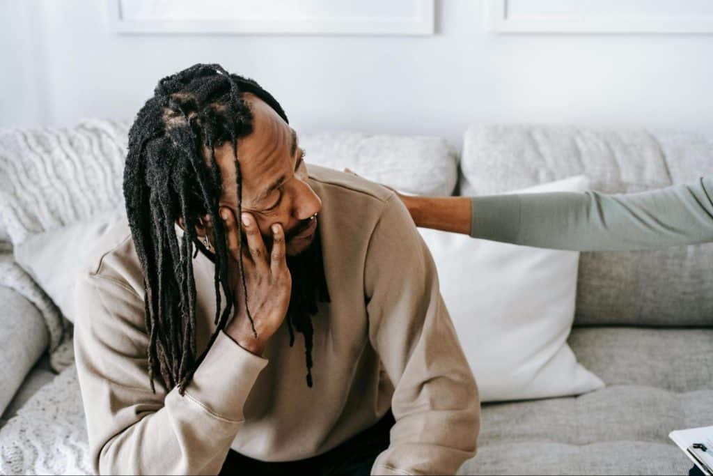 A man looking at the woman