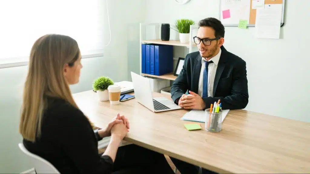 A man talking to woman