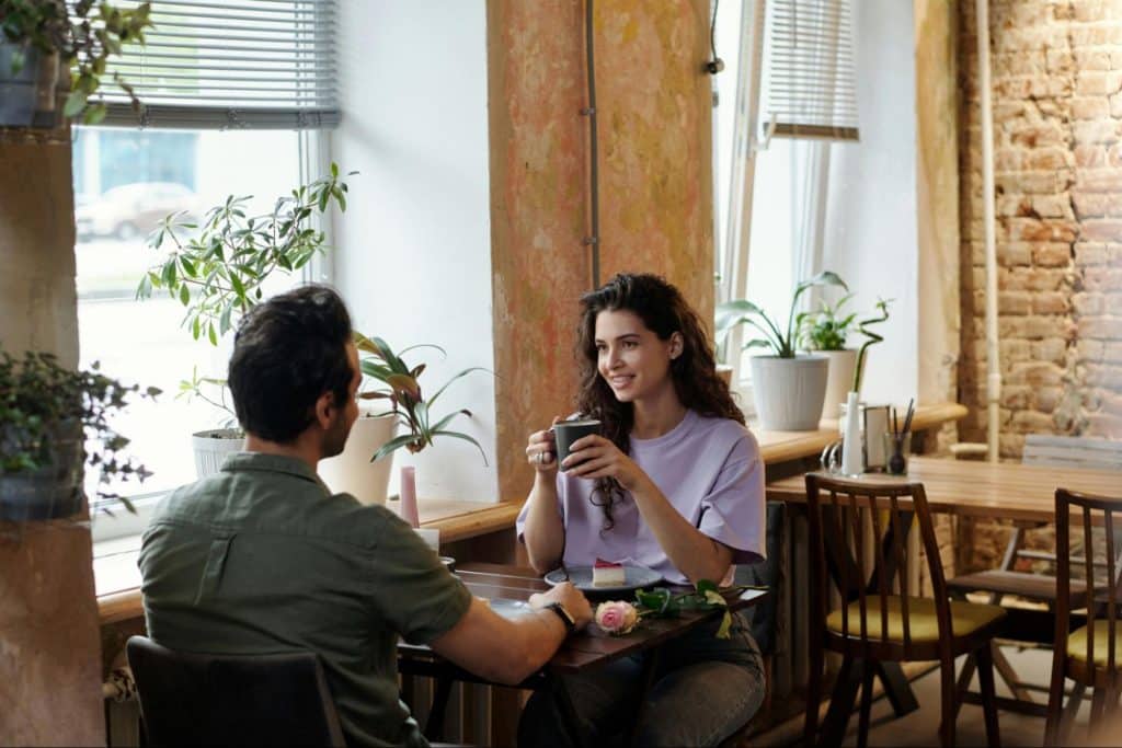A man and woman talking