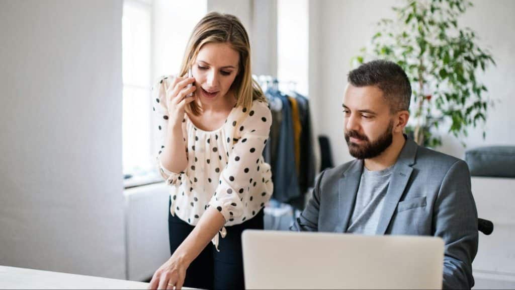 Woman leading a man