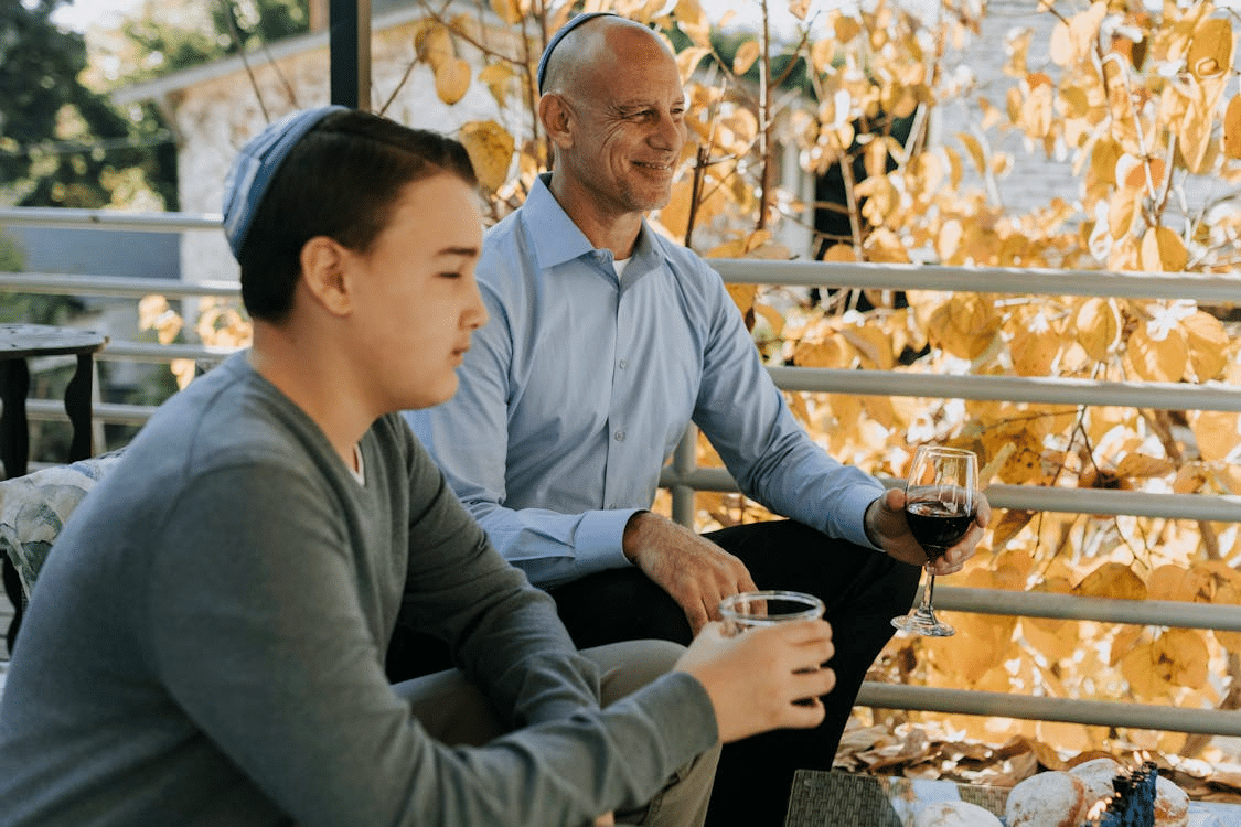 A man talking to his son