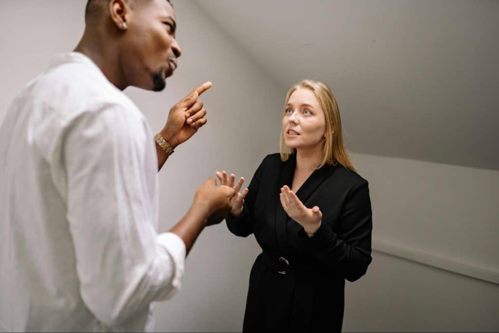 A man and woman arguing