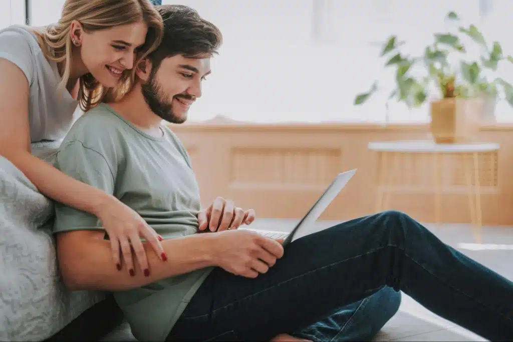A woman checking man’s activity