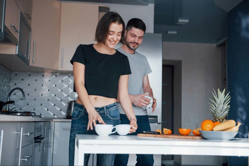 A man and woman together at home