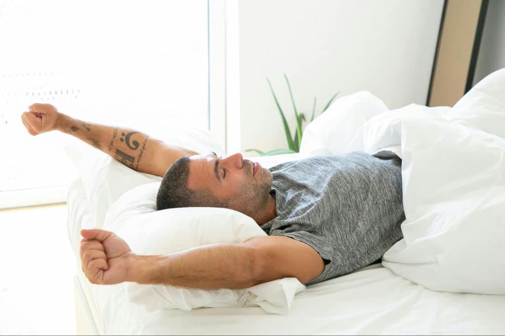 A man stretching his arms