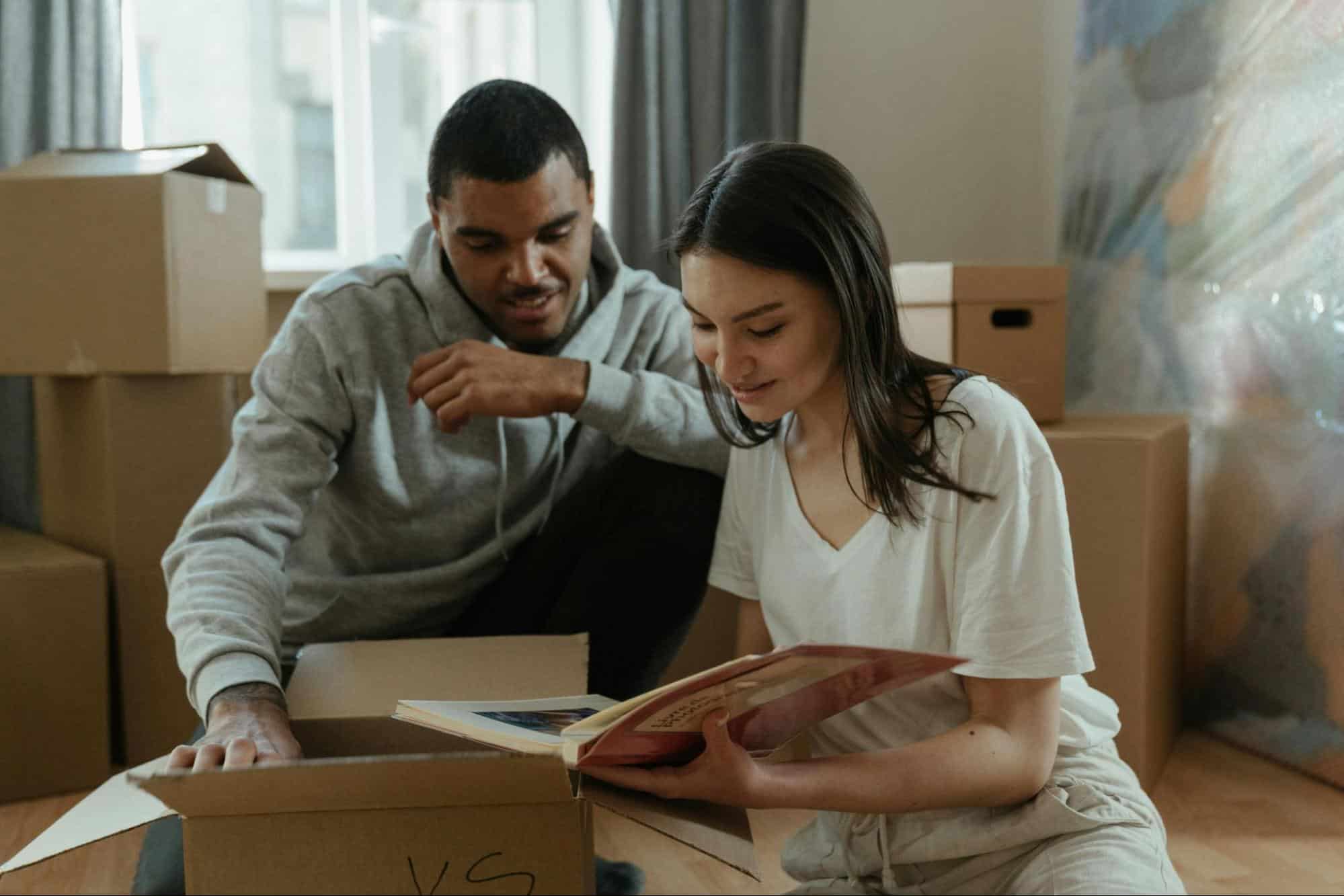 A woman showing something to a man