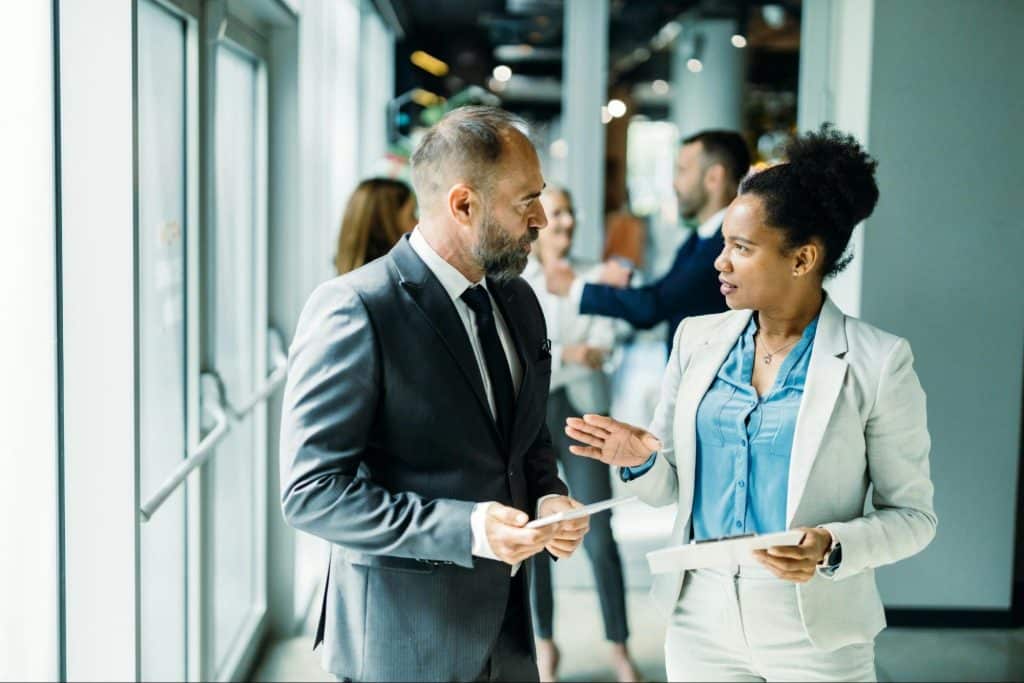 A man telling his plans to woman