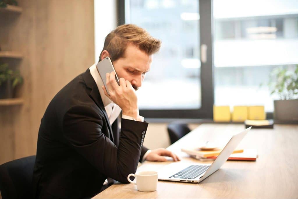 A man talking with someone over the phone