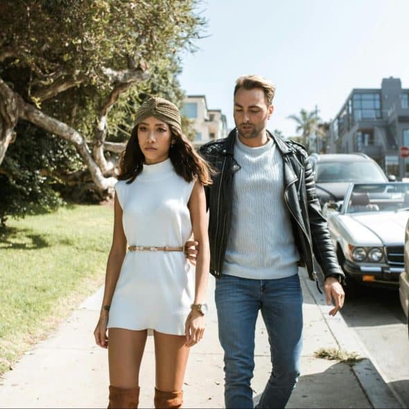 A man and woman walking