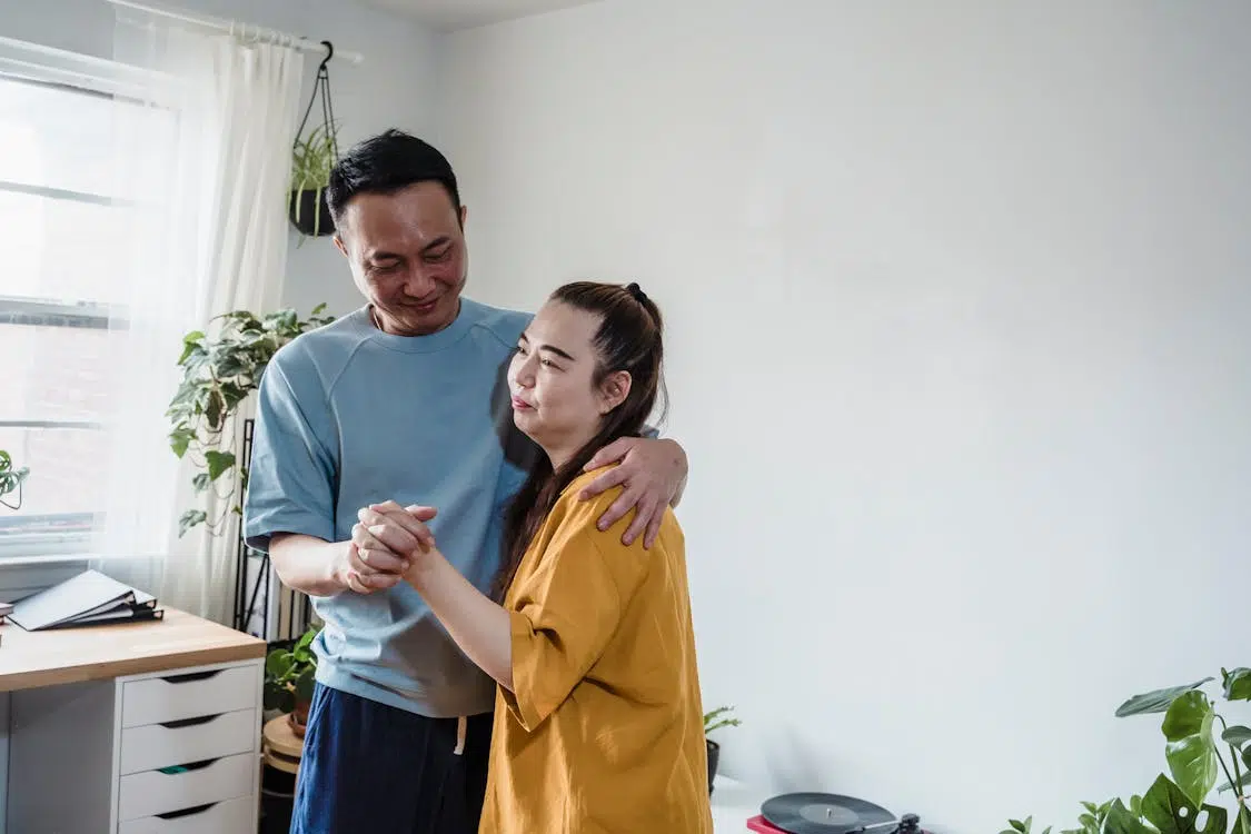 A couple hugging each other