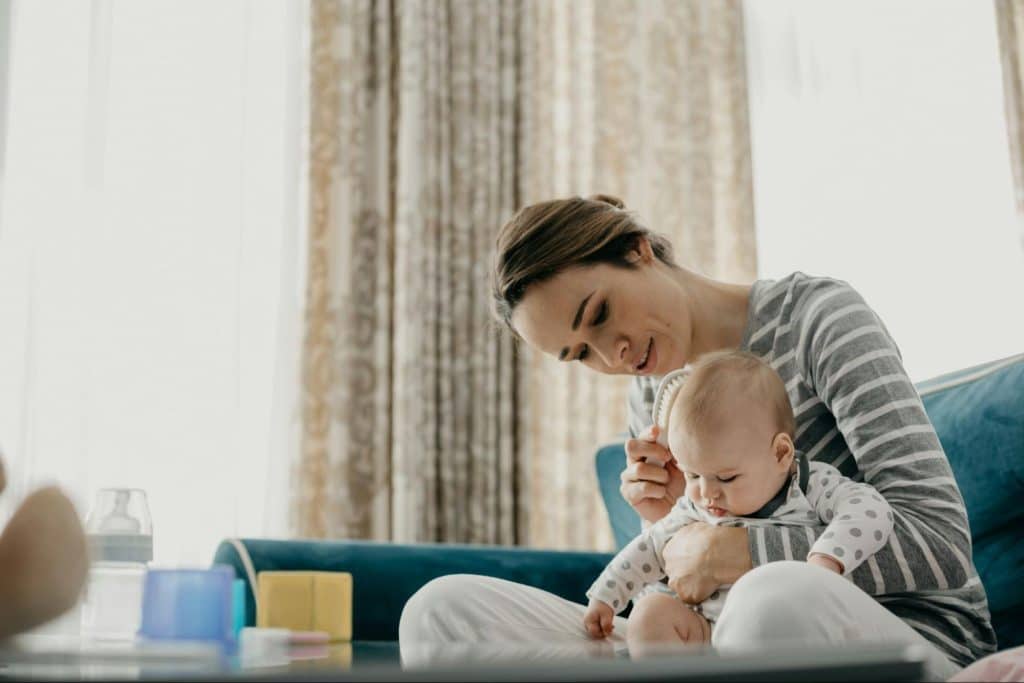 A woman checking her baby