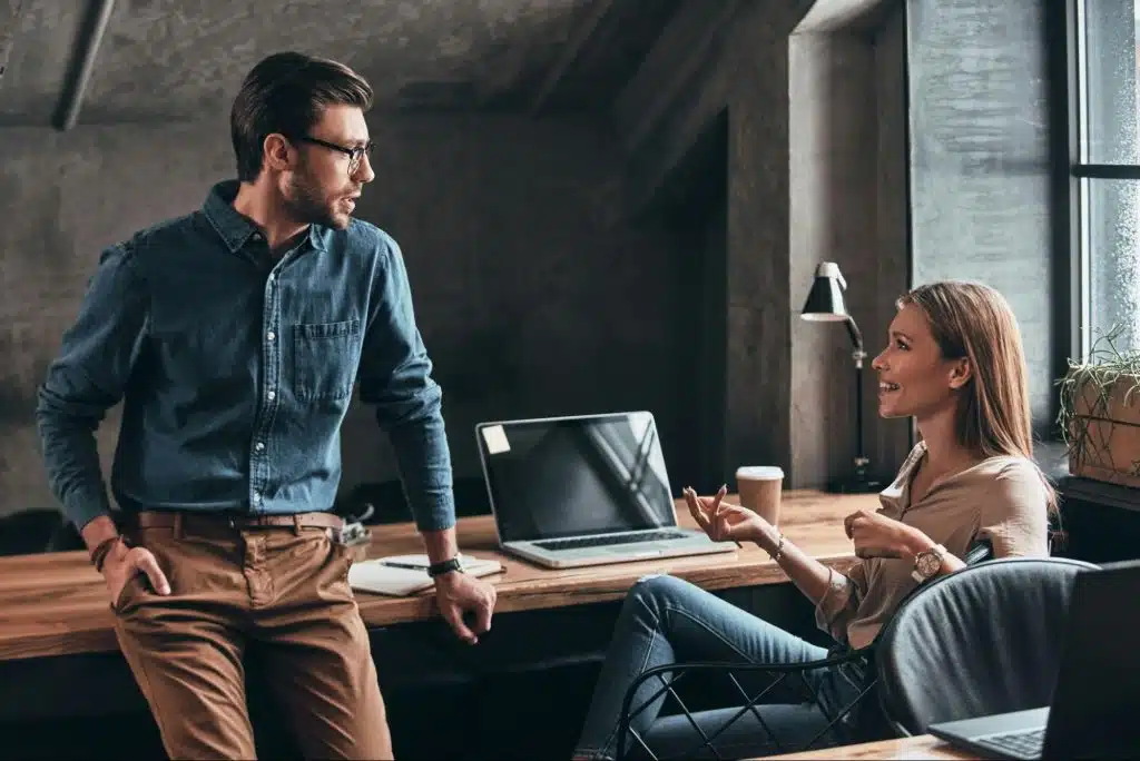 A man talking to woman