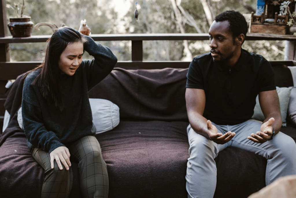 A man and a woman talking
