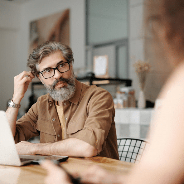 A man and a woman talking