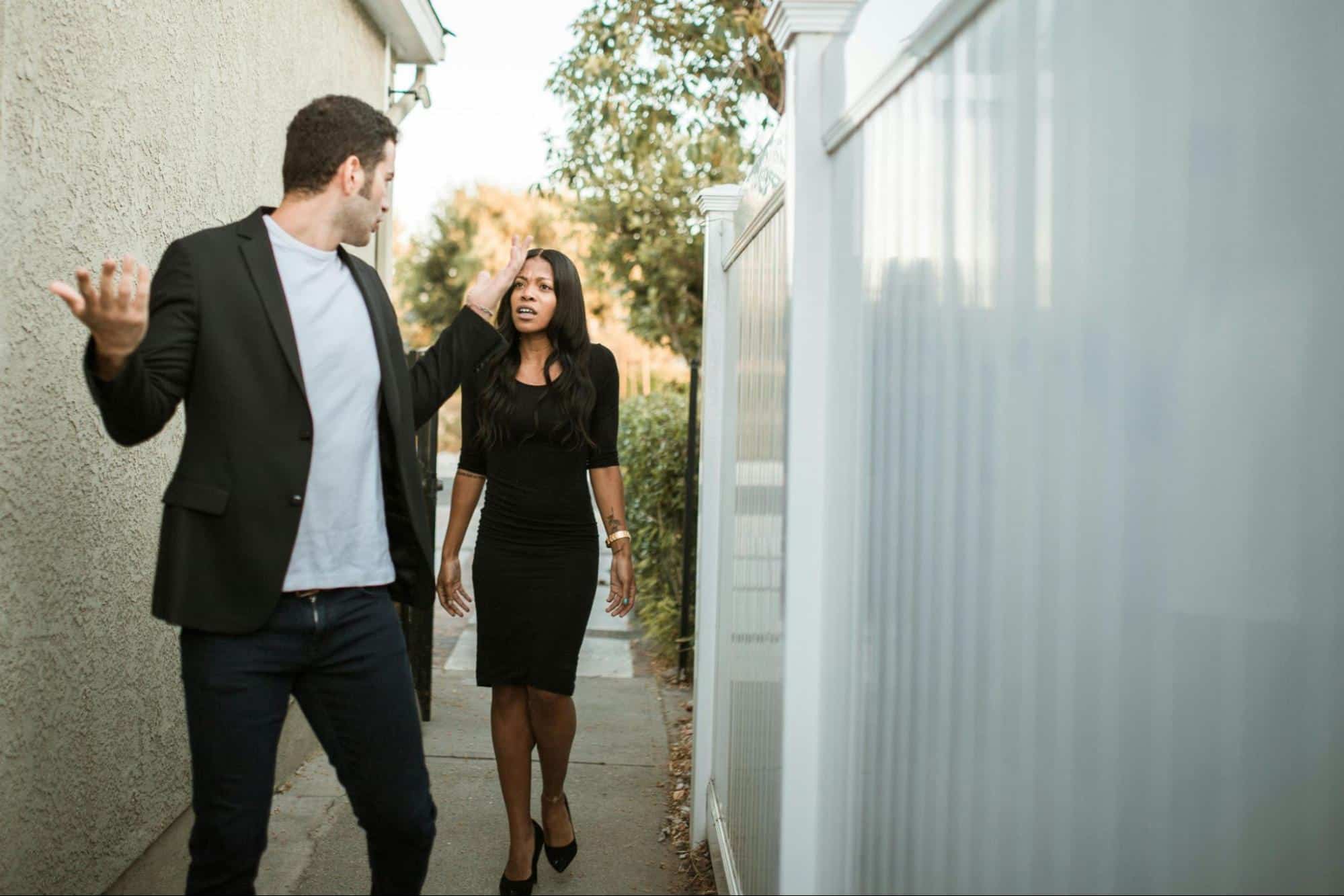 A man walking away from woman