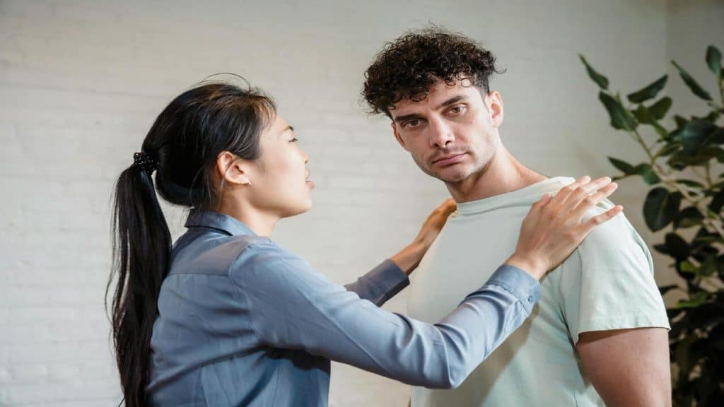 A couple having a serious talk indoors