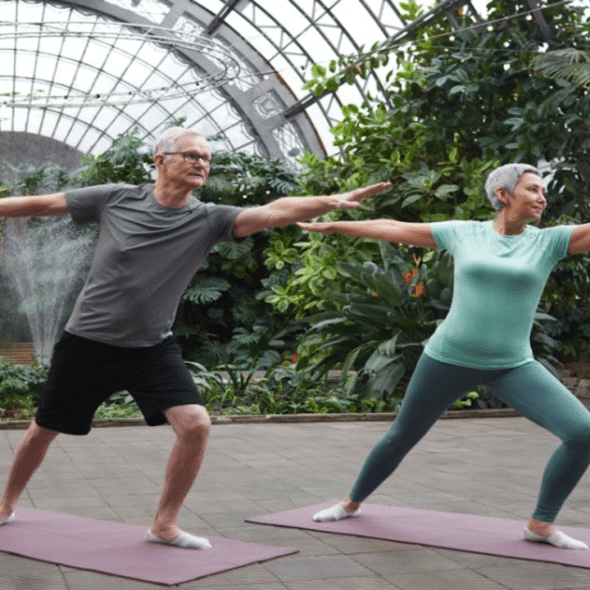 A couple practicing yoga