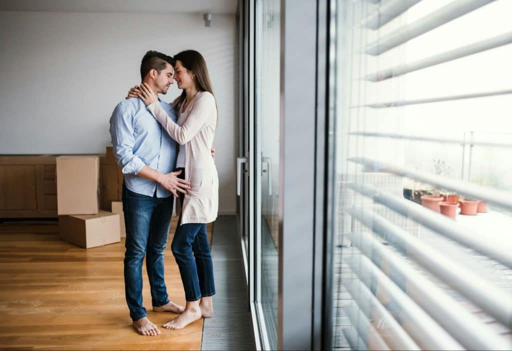 A man and woman facing each other